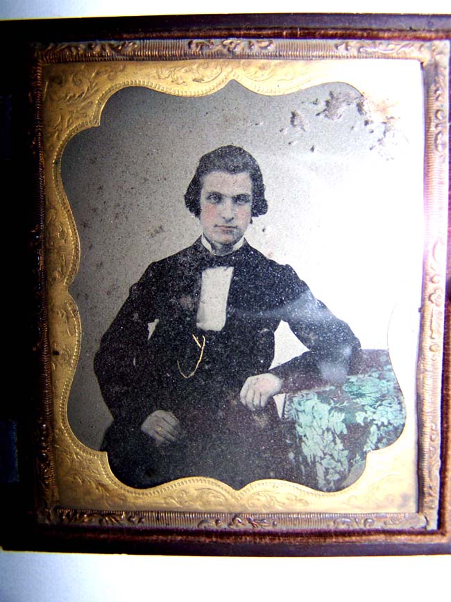 A Civil War ear Ambrotype photo of a gentleman in a beautiful Gutta Purcha 'Union' case circa 1863